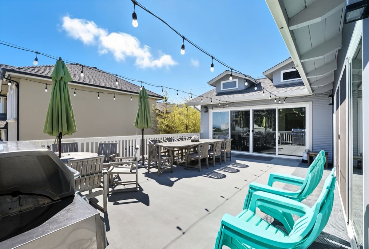 The main deck with umbrellas and grill